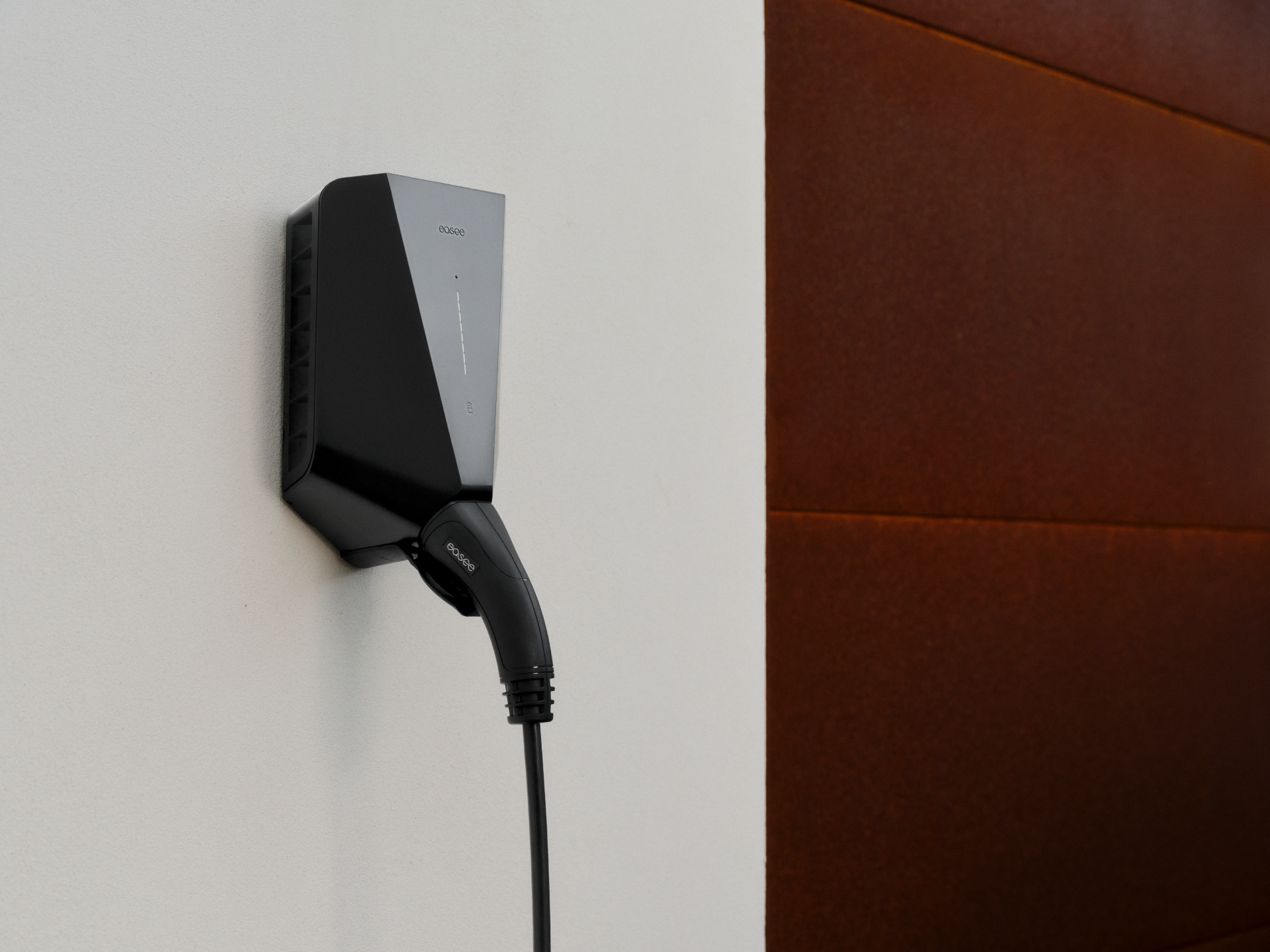 Easee One EV charger compact wall-mounted unit